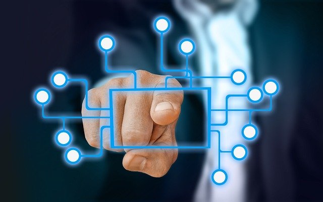ai automation - man pointing to circuits